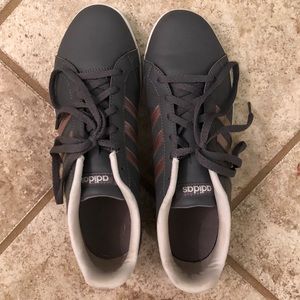 Adidas sneakers with rose gold accents